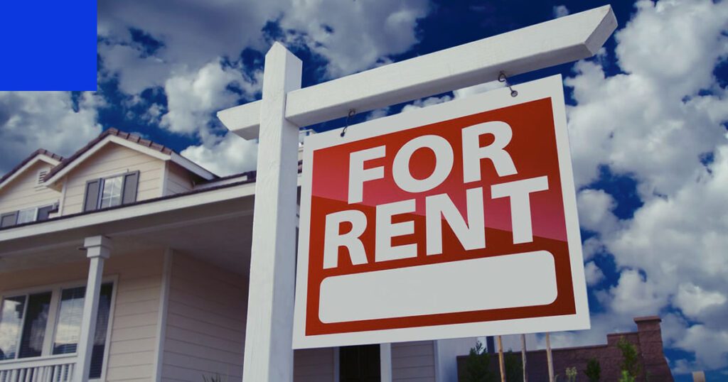 For rent sign in front of rental property.